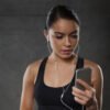 woman with smartphone using music app